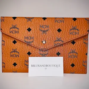 MCM Tangerine Logo Pattern Clutch thumbnail 6