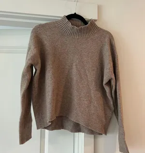 Uniqlo Tan wool blend mock neck sweater thumbnail 1