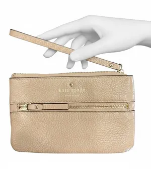 Kate Spade Beige Pebbled Leather Wristlet with Front zipper pocket. thumbnail 1