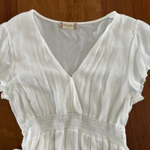 Altar'd State White Ruffled V-Neck Mini Dress thumbnail 3