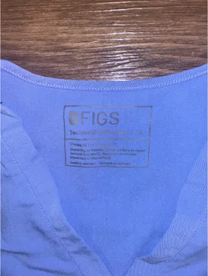 Figs women’s ceil blue scrub top with Aya Healthcare logo thumbnail 3