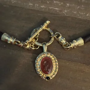 Brown leather braid toggle necklace with carved Roman head pendant thumbnail 4