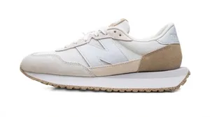 New Balance low-profile sneaker in white and beige thumbnail 1