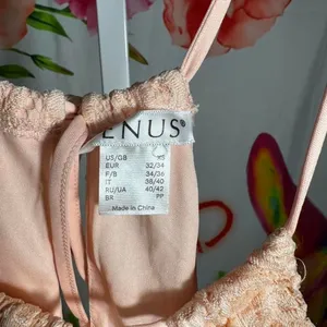 X276. Venus - peach lace mini dress with ruffles and tie back detail thumbnail 2