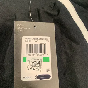 Under Armour Women's Black and White Athletic Shorts thumbnail 4