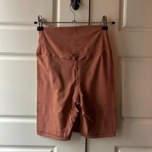 Offline by Aerie Terracotta Biker Shorts thumbnail 2