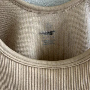 Offline by Aerie Ribbed Stretch Tank Neutral Cream Medium thumbnail 3