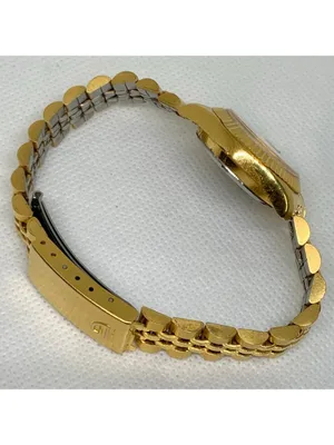 Gruen since 1874 gold tone date classic watch 26mm Japan up to 7.5” running thumbnail 9