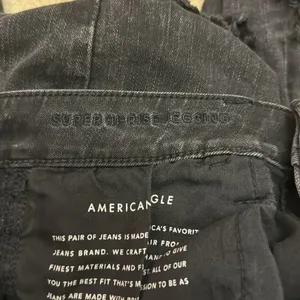 American Eagle black ripped jeans thumbnail 6