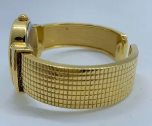 Ladies Quartz analog 30mm gold tone cuff bracelet watch white dial size 7” runs thumbnail 3