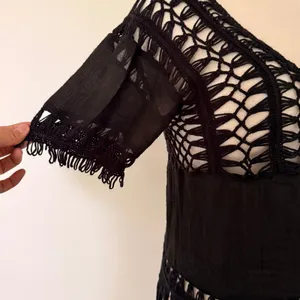 Black Crochet Open Work Yoke Fringe Tassel Hem Boho Witchy Festival Tunic Top thumbnail 3