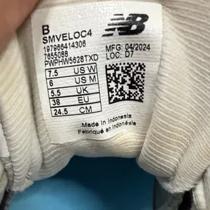 New Balance VELOv4 Women's White and Gold Athletic Sneakers Softball thumbnail 9