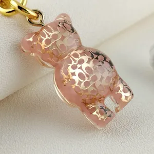 Coach Resin Gummy Bear Bag Charm Gold and Pink. Perfect for Coach Collectors! thumbnail 4