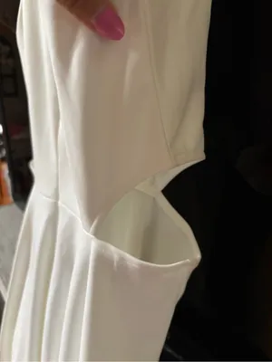 Sleeveless White Mini Dress with Side Cutouts thumbnail 10
