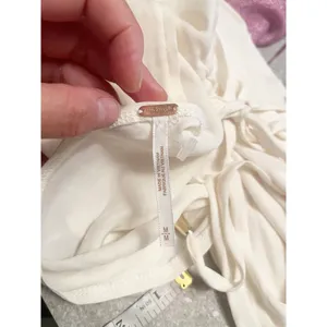 FREE PEOPLE Rachel Silky Top Ivory V-Neck Slinky Jersey Cropped Medium NWOT thumbnail 11
