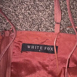 White Fox Boutique pink mini dress with ruffled hem and tie front detail, size S thumbnail 2