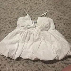white boutique tank thumbnail 1