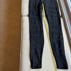 Lululemon Black Leggings with criss cross sheer panels down front of leg size 6 thumbnail 4