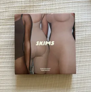 SKIMS Seamless Sculpt Thong Bodysuit in “Sand” thumbnail 3