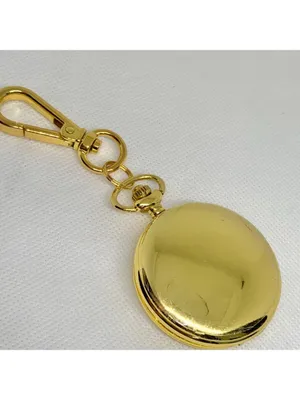 Women’s gold tone pocket watch joy & iman green dial Quartz analog 46mm running thumbnail 4