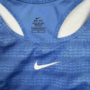 Nike Swoosh Dri-FIT Women’s Sports Bra Medium Blue Racerback Athletic thumbnail 3