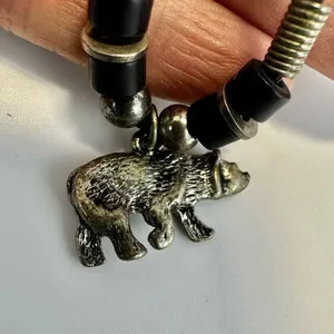 Silver tone bear pendant necklace on black cord thumbnail 6