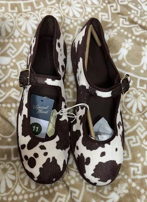 Universal Threads Brown and White Cow Print Flats thumbnail 1