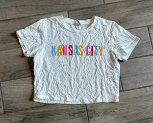 Charlie Hustle White Short Sleeve Graphic Tee with Multicolor 'Kansas City' Lettering thumbnail 1