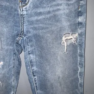 American Eagle Next Level Stretch Crop Jegging Distressed Ripped Blue Jeans 10 thumbnail 6