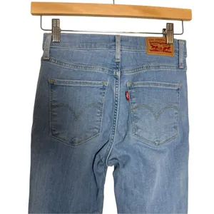 Levi’s 720 High Rise Super Skinny Distressed Light Wash Stretch Denim Blue Jeans thumbnail 5