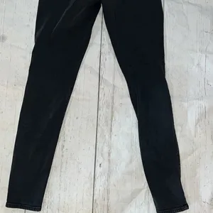 American Eagle black high rise skinny jeans thumbnail 5