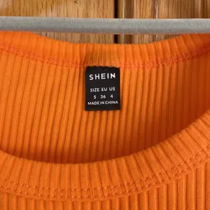 Orange crop top from shein. Cute and summer vibes. thumbnail 2