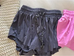 Women’s gray athletic flowy shorts thumbnail 1