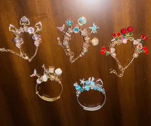 Set of 5 charm bracelets 4 gold 1 silver thumbnail 1