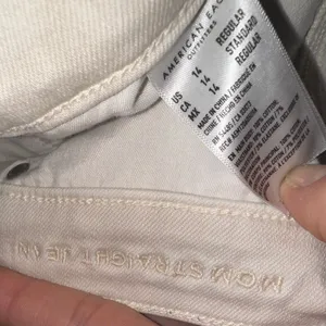 American Eagle 14 cream relaxed normcore mom jeans thumbnail 3