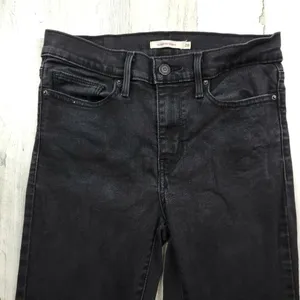 Levi’s Slimming Skinny Jeans Women’s Size 28 Black Stretch Denim Mid Rise thumbnail 7
