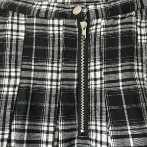 Dolls Kill Trickz N Treatz Black and White Plaid Pleated Mini Skirt Size Small thumbnail 5