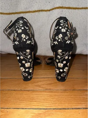 Mari A black floral heels feature a high block heel thumbnail 3