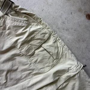 L.L. Bean convertible cargo hiking pants feature a built-in webbed belt and zip-off lower legs. thumbnail 5