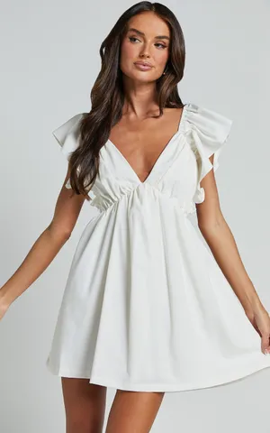 Showpo Raiza Mini Dress Ruffle Sleeve Tie Back Plunge Dress 100% Cotton In Off White! thumbnail 1