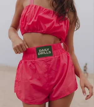 NWOT DAILY DRILLS Two Piece Bubble Crop Top and Skort size Small in Punch thumbnail 1