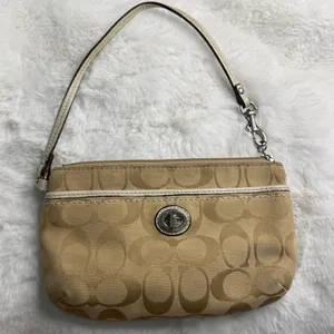 COACH Tan Signature Canvas Turnlock Wristlet thumbnail 1