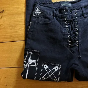Dolls Kill Current Mood Stitch Lace-Up Patchwork Jeans black stretch denim s got thumbnail 4
