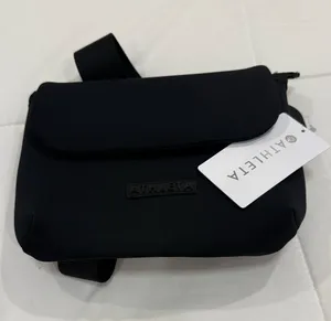 ATHLETA NWT Black Diem Crossbody Bag Sleek Neoprene Travel Pouch 9x7 thumbnail 1