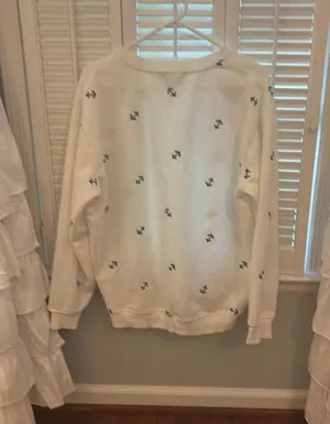 White hoodie with blue anchors on it thumbnail 1
