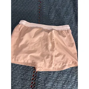 Tan Athletic Shorts with White Elastic Drawstring Waistband and Pockets thumbnail 4