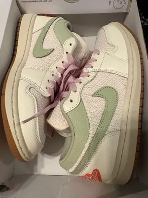 Nike sneakers. Cream, green and coral knit like thumbnail 1