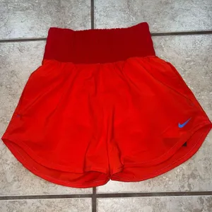 Nike High-Waisted Dri-Fit Shorts thumbnail 1