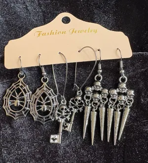 Set of 3 Pairs of Silver-Tone Halloween Themed Earrings with Spider, Skeleton, & thumbnail 1