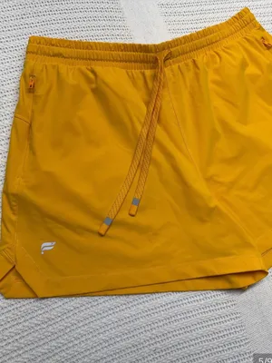 Fabletics Women's The One Shorts feature a 3-inch inseam and an adjustable draws thumbnail 5